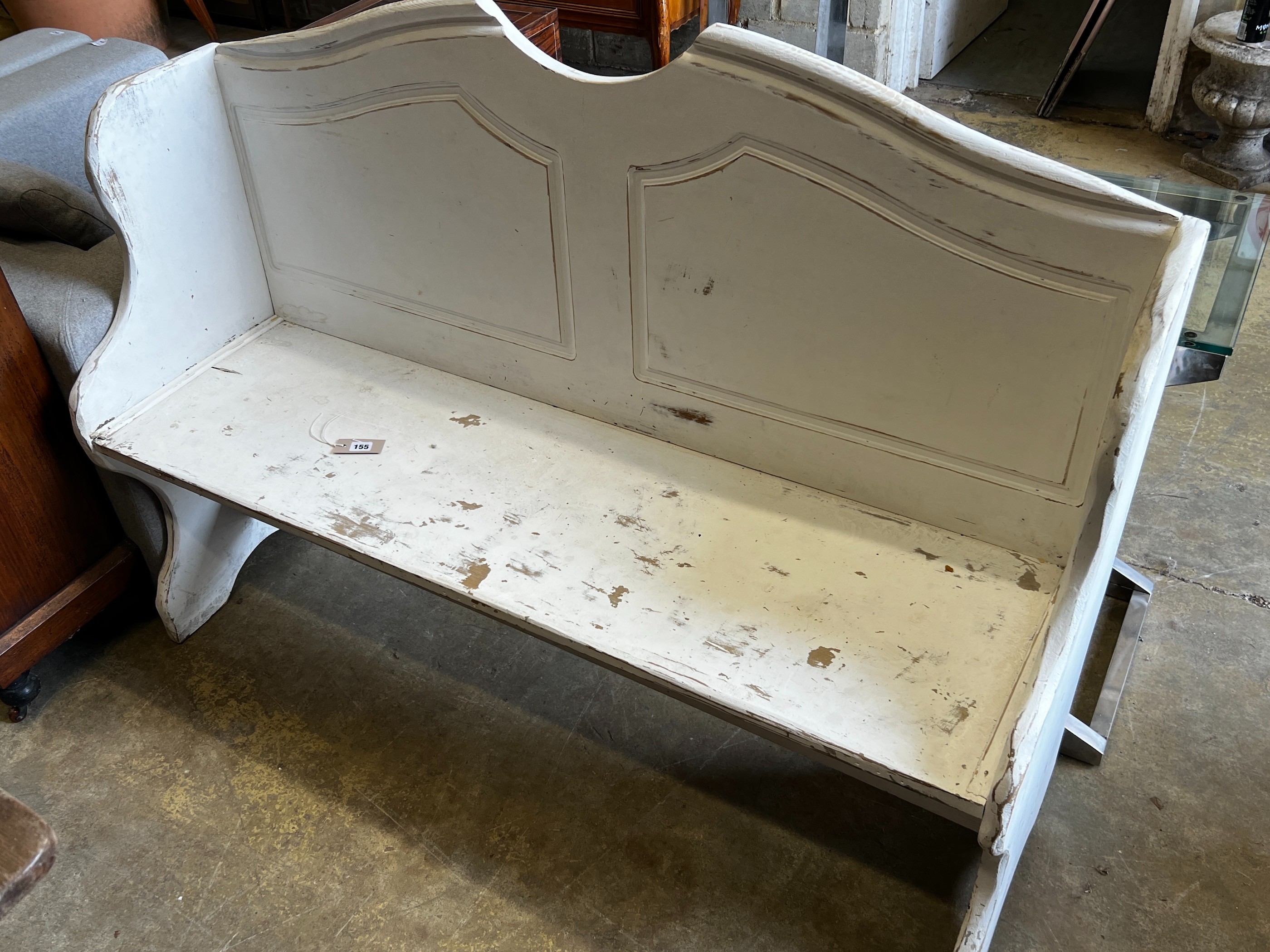 A 19th century style continental painted oak settle, width 143cm, depth 44cm, height 100cm